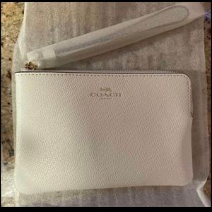 Coach ivory wristlet